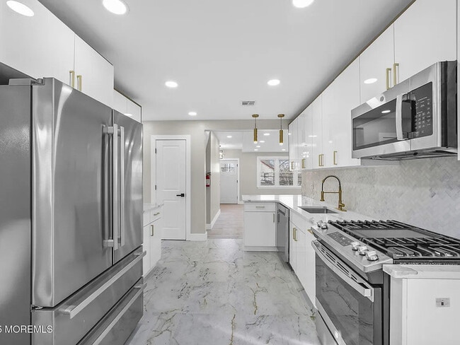 Building Photo - Beautifully Renovated Home in a Sought Aft...