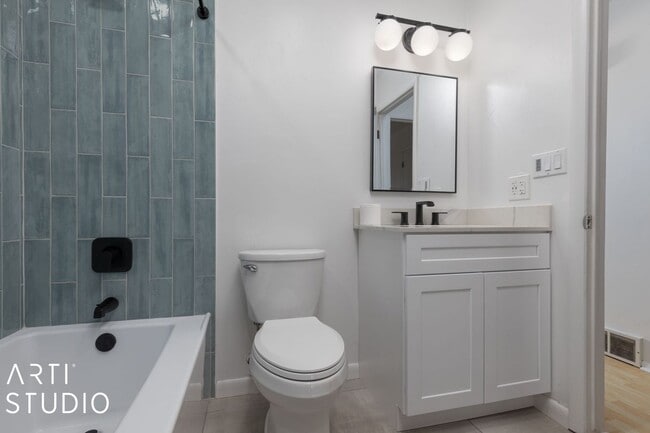 Building Photo - Fully Renovated 4-Bedroom Townhome in Prim...