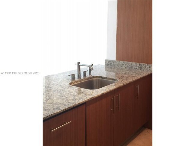 Building Photo - 10275 Collins Ave