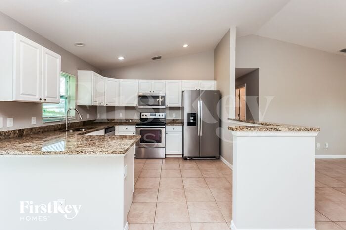Building Photo - 12097 Helios Ave