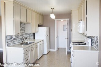 Building Photo - Beautiful upgraded 2BR condo in the Quail ...