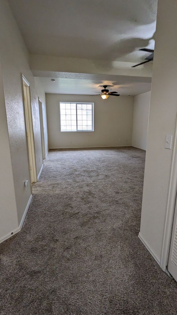 Building Photo - RANCH 3 BED/3 BATH PATIO HOME WITH MAIN FL...