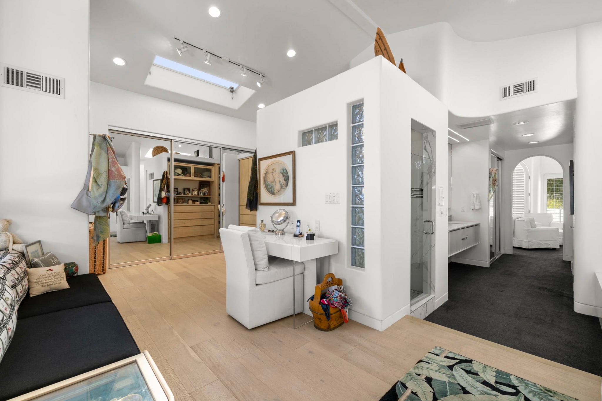 Primary suite offers extensive closet space and dedicated dressing areas. - 120 Mast Mall