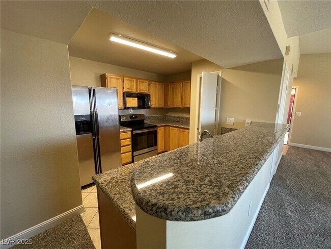 Building Photo - 5055 W Hacienda Ave