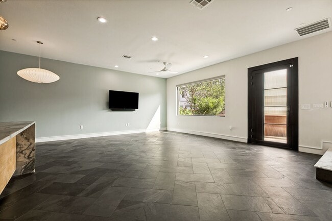 Building Photo - LUXURY TOWNHOME IN LONE STAR DISTRICT