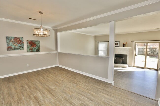 Building Photo - Updated End-Unit Brick Townhome Ready NOW!...