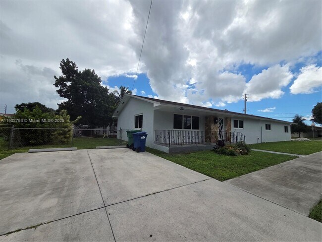 Building Photo - 10725 NW 8th Ave