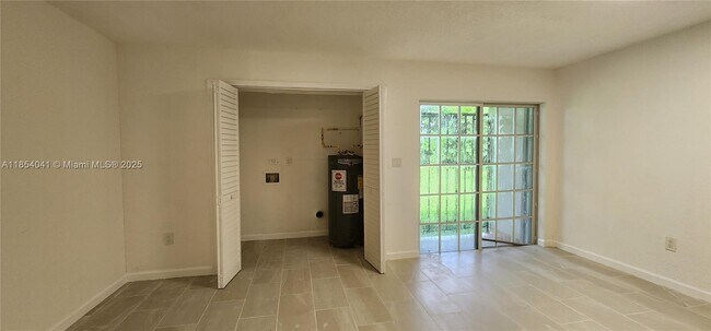 Building Photo - 10380 NW 10th Ave