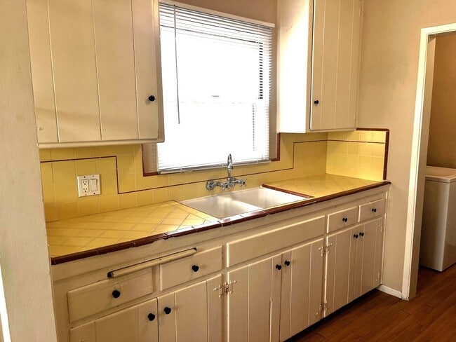 Building Photo - 2BR 1BA Allied Gardens Home - Hardwood Floors, Washer/Dryer, 2 Car Garage, HUGE backyard, 2 Pets ...