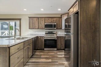 Building Photo - MODERN TOWN HOMES WITH IN-UNIT LAUNDRY