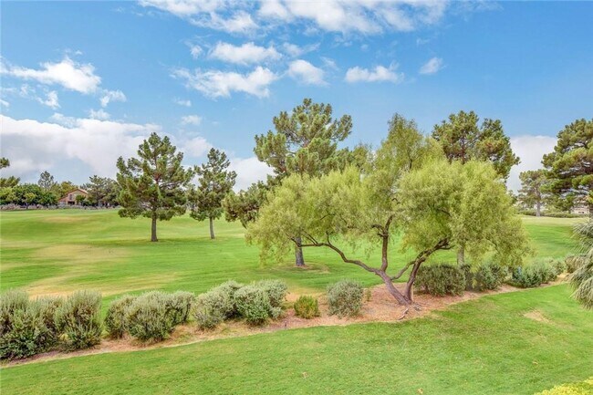 Building Photo - Amazing condominium in gated upscale neigh...