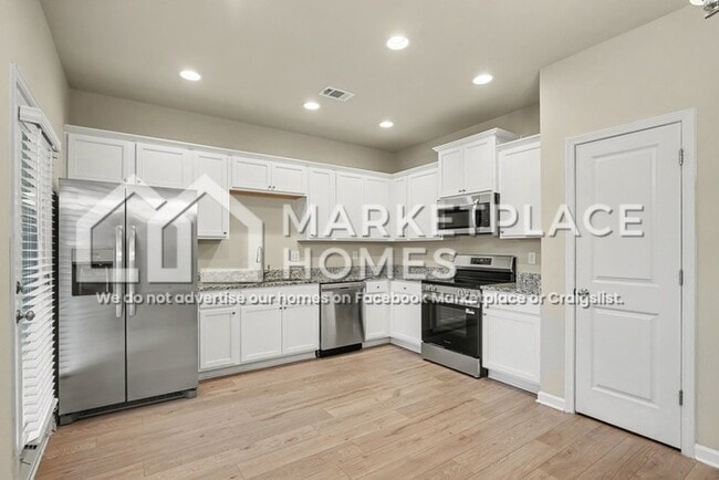 Building Photo - 215 W L Miller Dr
