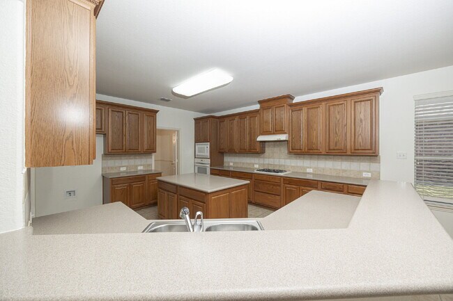 Building Photo - Spacious 4-Bedroom Home with Large Backyard in Rowlett