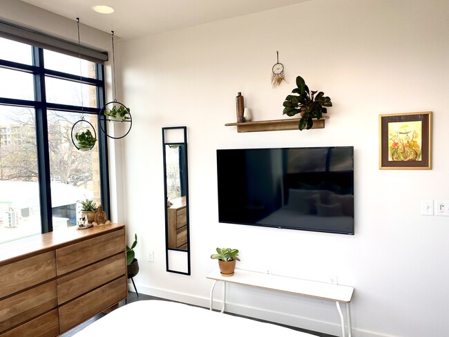 Bedroom's other vantage point, with lovely decor and a Roku TV - 1501 E 4th St