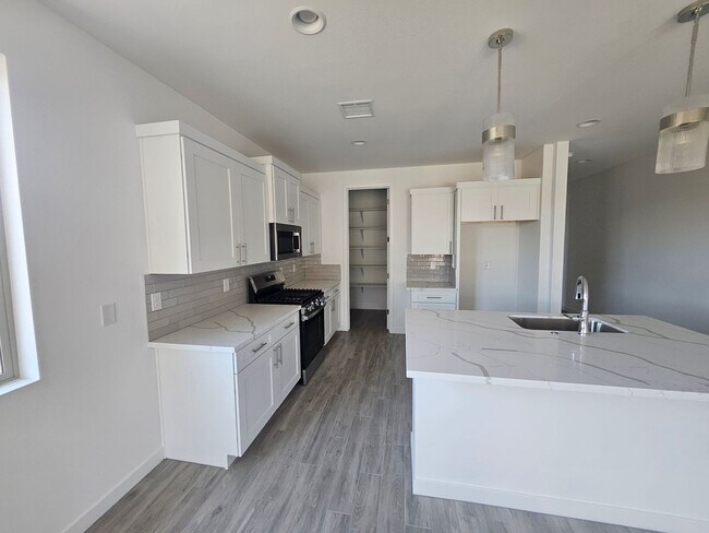 Building Photo - Imoroved Pricing!  Brand New Laughlin Ranch Home