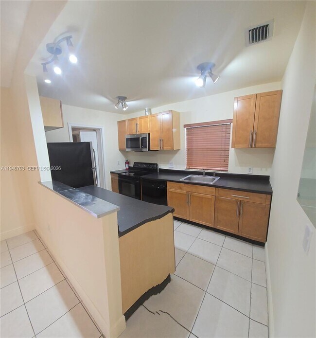 Building Photo - 4320 SW 138th Ct