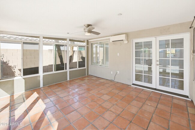 Building Photo - 9321 E Caribbean Ln