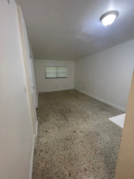 Living Room Closed Blinds - 665 NE 83rd Ter