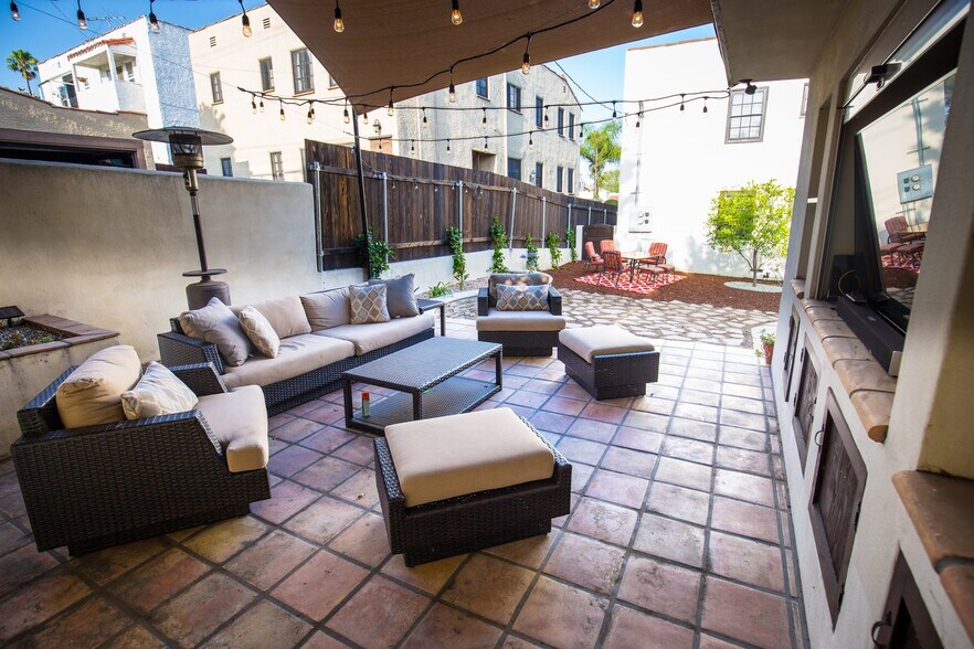 Outdoor patio shared with downstairs neighbor - 1327 S Sycamore Ave