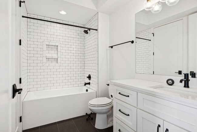 Building Photo - Experience elevated living in this beautifully crafted brick residence located in the heart of Ed...