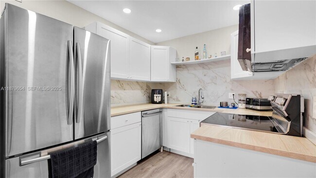 Building Photo - 6301 N Falls Cir Dr