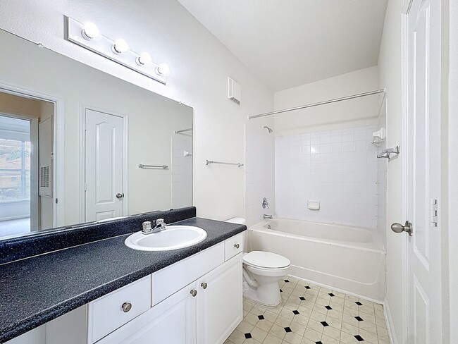 Building Photo - Updated 3 Bedroom, 2 Bath Mirabella Condo ...