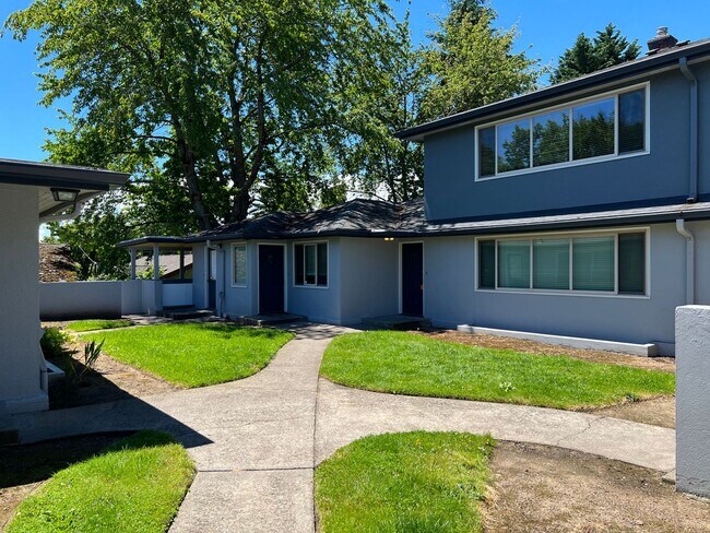 Building Photo - Stunning / Extra Large 1-Bedroom! Faux Hardwood Floors, Washer & Dryer, Stainless Appliances & Pe...