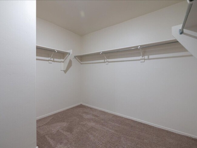 Building Photo - Spacious 4-Bedroom Home with Open Layout & Turf Backyard