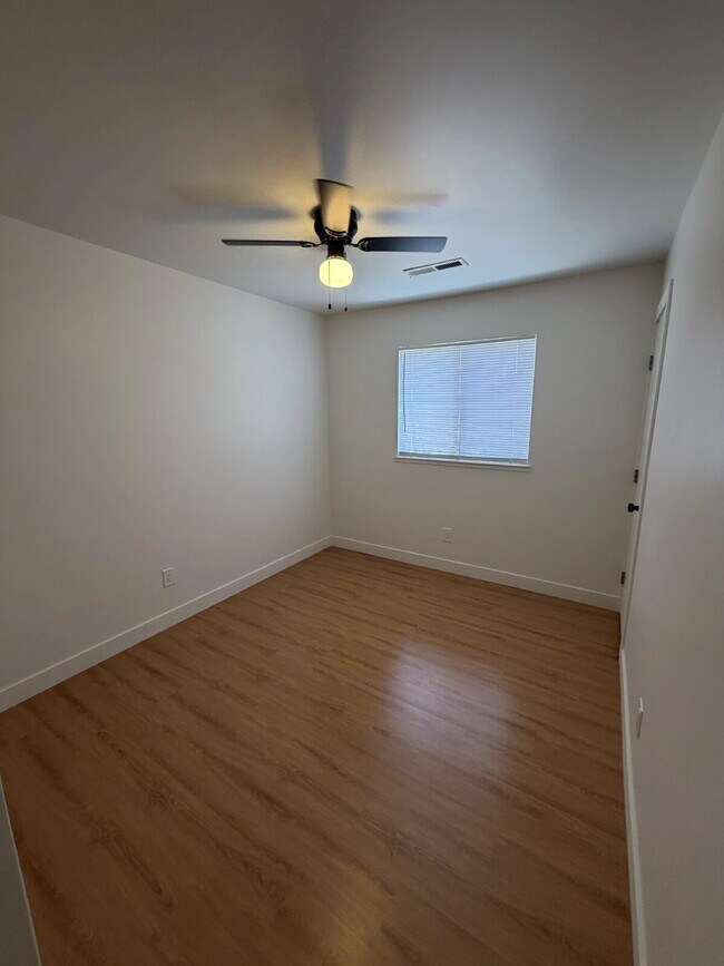 Building Photo - Beautifully Updated Interior – New Flooring, Countertops & Fresh Paint Throughout