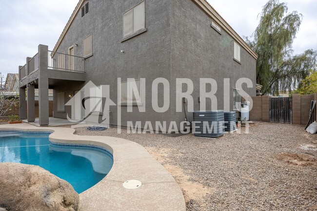 Building Photo - Large Beautiful Home with a Pool in a Prim...