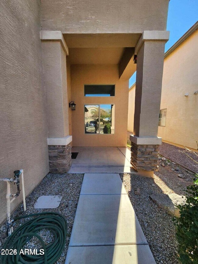 Building Photo - 42065 W Hillman Dr