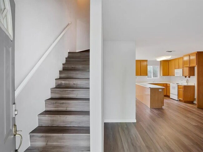 Building Photo - This is a lovely halfplex with 2 stories, 3 bedrooms, and 2.5 bathrooms in a quiet HOA neighborhood
