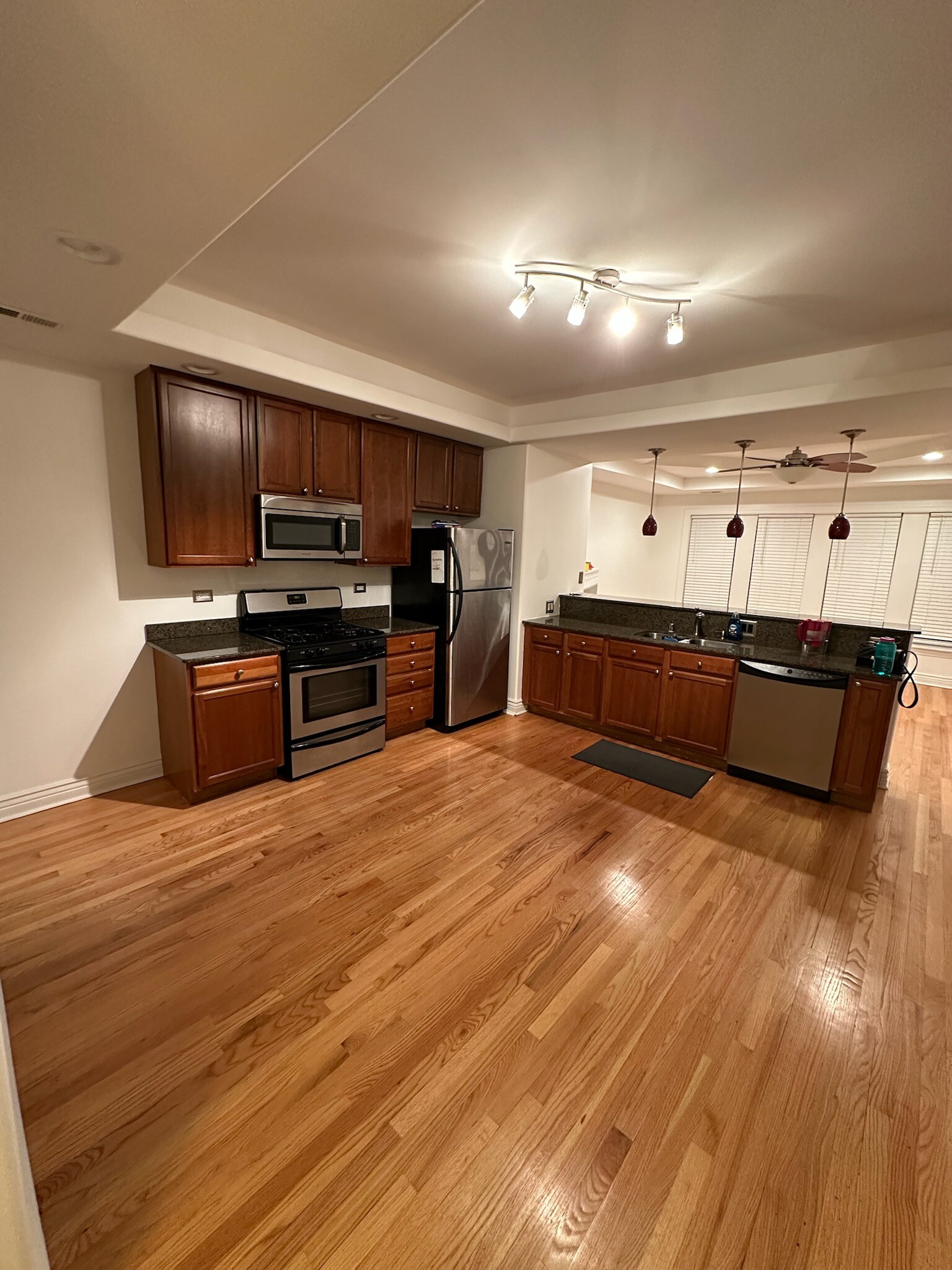 Open concept kitchen and dining area - 6709 N Lakewood Ave