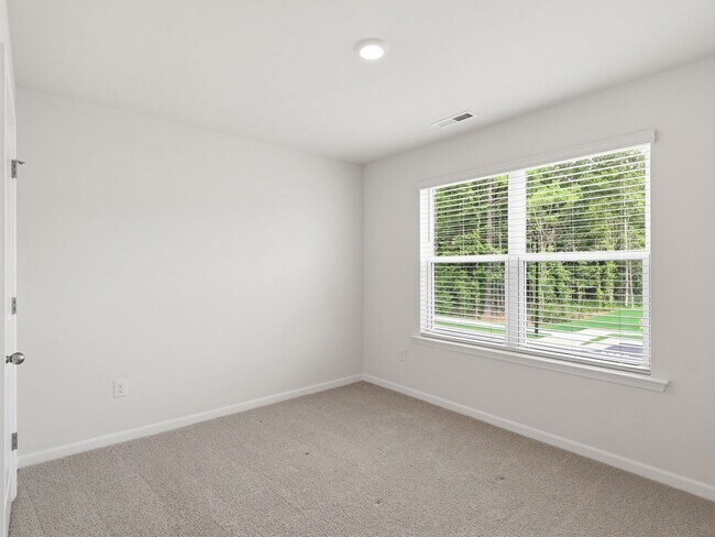 Building Photo - Newly Built 3BD, 2.5BA End Unit Raleigh Townhome with a Fenced Yard in a Prime Location