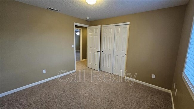 Building Photo - 9302 W Caelen Ave