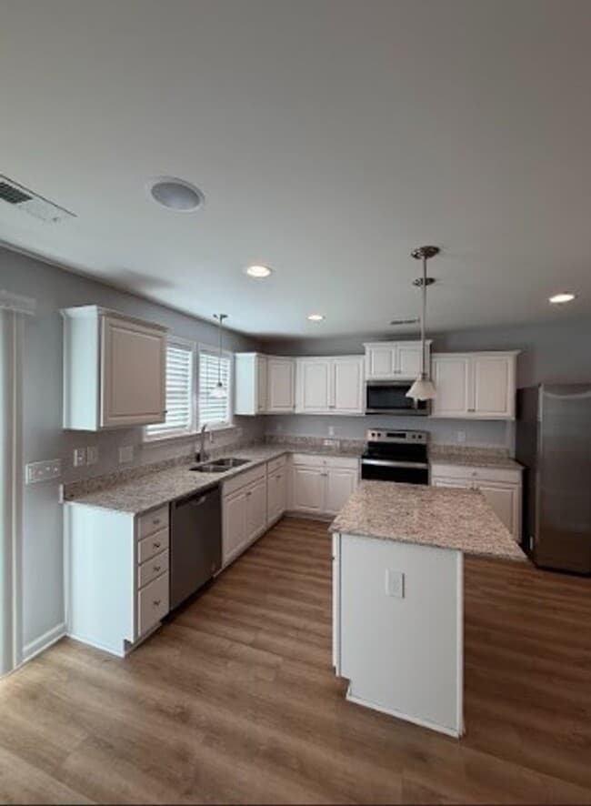 Building Photo - Newly Renovated Single Family Home | 4 BR/2.5BA | Garage Attached