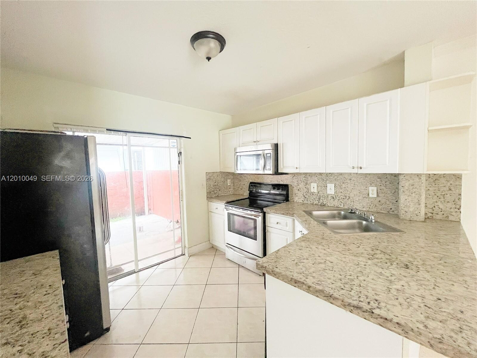 Building Photo - 11051 W Okeechobee Rd