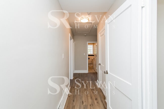 Building Photo - The living is easy in this 3 bedroom, 2 bathroom brick home