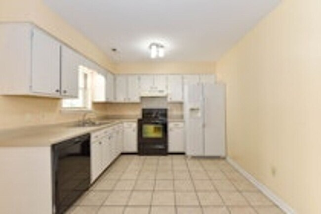 Building Photo - Pet Friendly - Fully Fenced in Yard with Two Storage Buildings