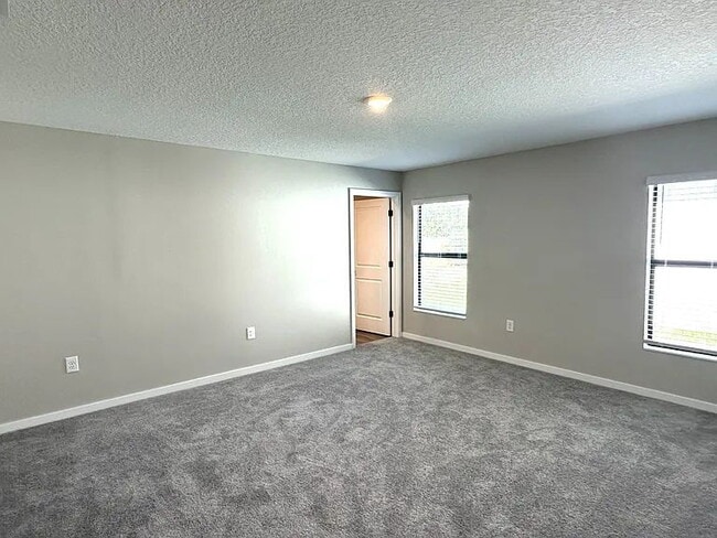 Building Photo - This almost new home is in the beautiful Crossings at Palm River Neighborhood, 5 minutes from 618...