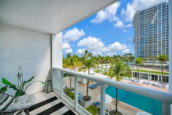 Building Photo - 10275 Collins Ave