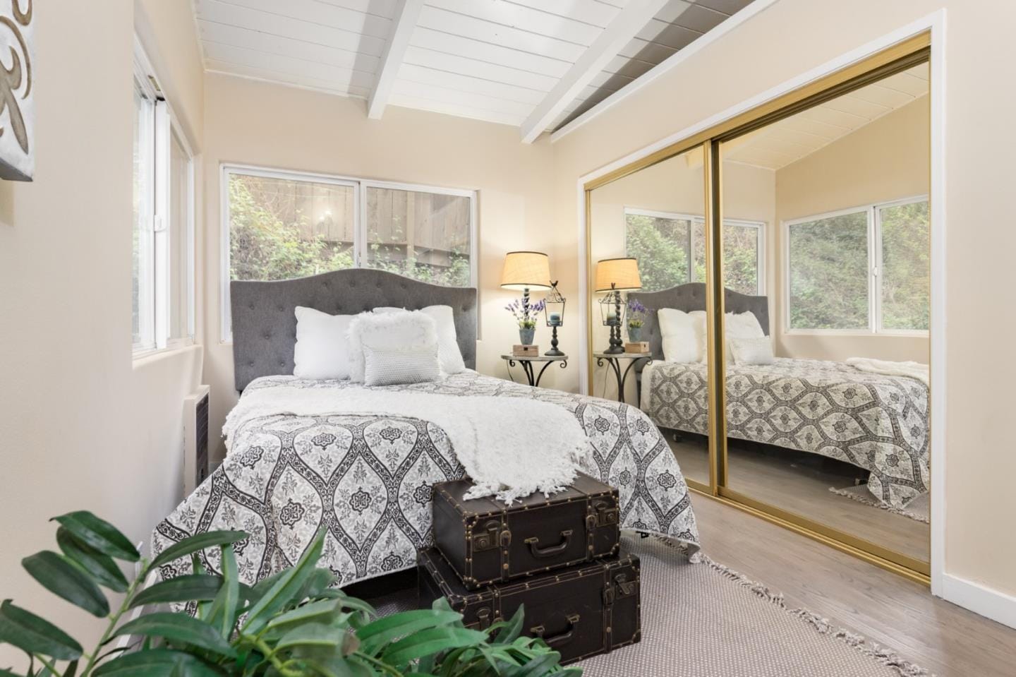 Larger bedroom is approx 15x10 and has a 8' closet with mirrored closet doors. - 665 Cathedral Dr