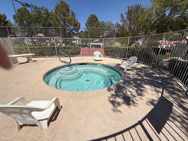 Building Photo - TWO BEDROOM TOWNHOME IN THE LAKES WITH GARAGE AND ATTACHED CARPORT