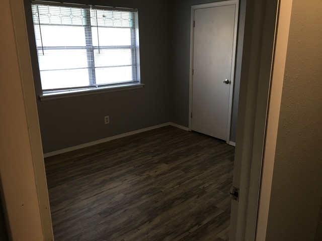 Bedroom 1 with walk-in closet - 910 S East Ave