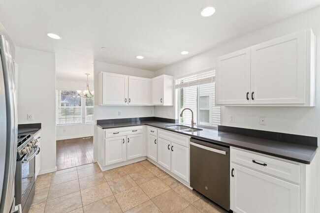 Building Photo - Spacious DuPont Home with A/C, Bonus Loft, Large Patio & Fully Fenced Yard!
