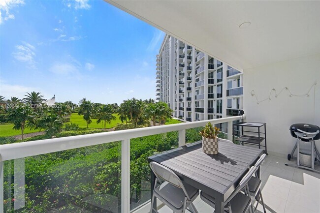 Building Photo - 10275 Collins Ave