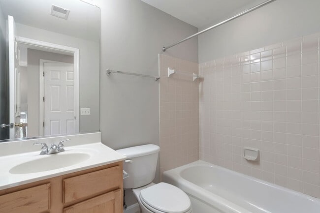 Building Photo - COMING SOON - Great 4 level end unit TH in...
