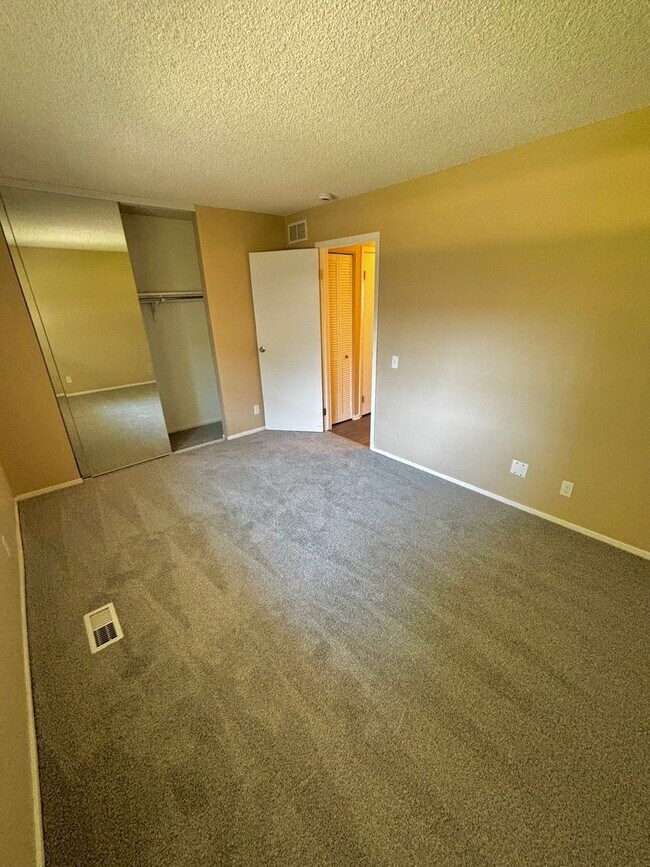 Building Photo - Live in Style! Updated Denver 2-Bedroom Townhome with Modern Design & Large 1-Car Garage!!