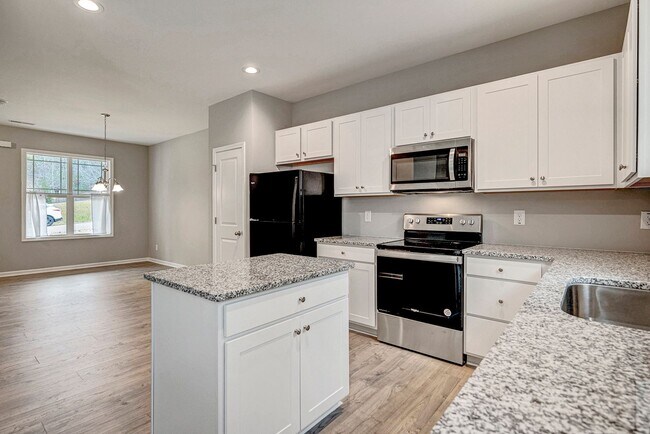 Building Photo - MOVE IN READY! BRAND NEW 4 bedroom 2.5 bat...