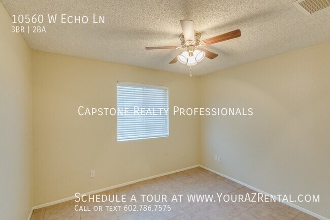 Building Photo - 10560 W Echo Ln